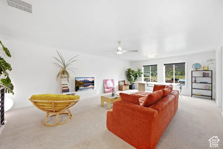 Bright interior space with white walls and light-toned carpeting