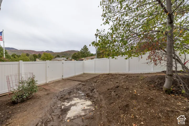 White vinyl fencing with a gate