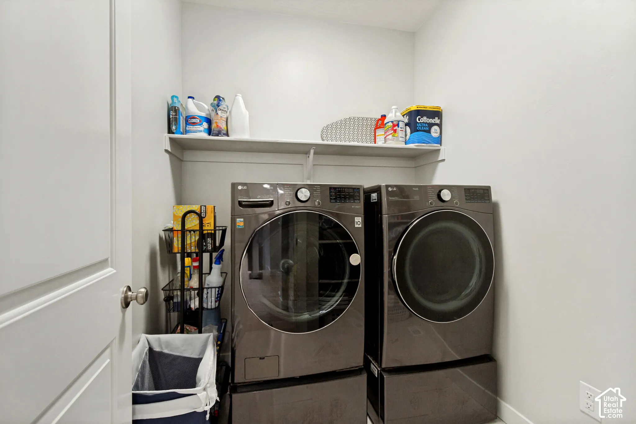 White walls and trim, overhead shelving