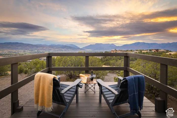 Expansive outdoor deck with mountain scenery