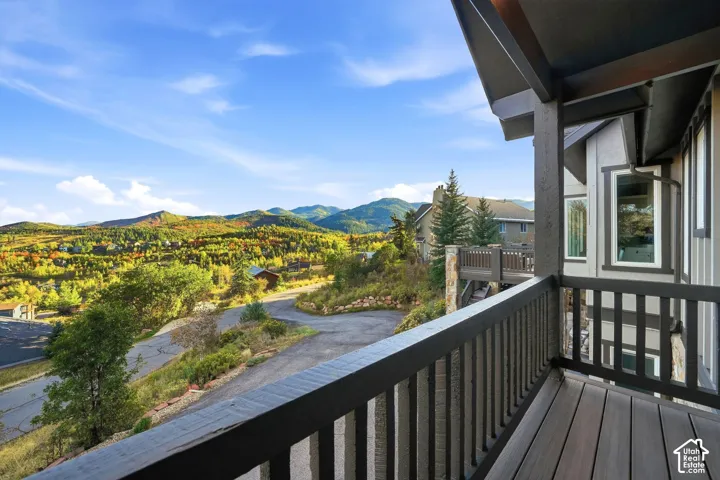 Exterior balcony with composite decking and dark-stained railing