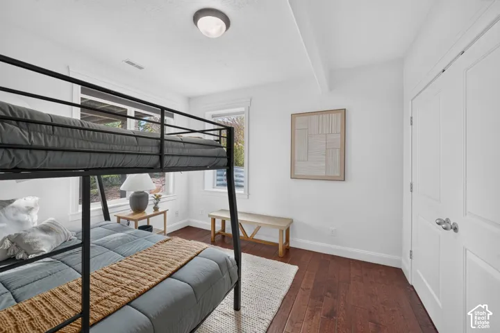 Rich wood-finish flooring complements white walls and trim