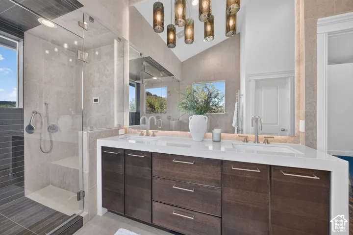 Dual vanity with integrated sinks and custom wood cabinetry