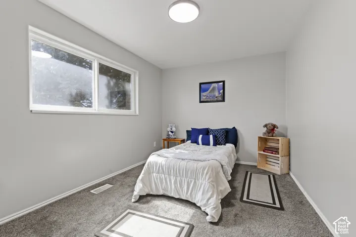 White-framed window and neutral wall finish