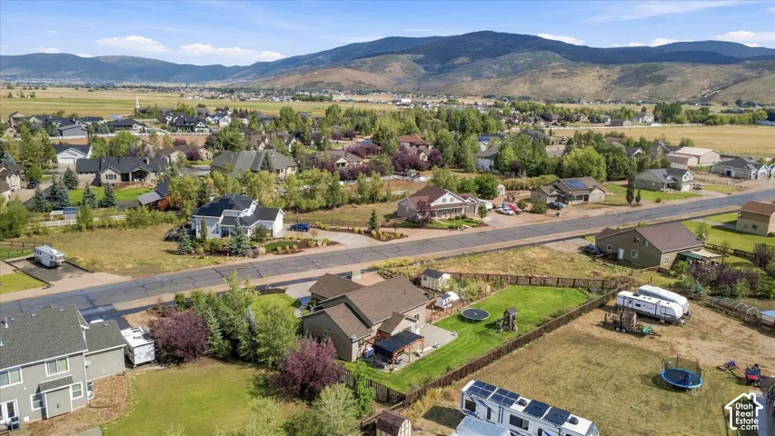 Residential setting with expansive natural surroundings and distant mountains