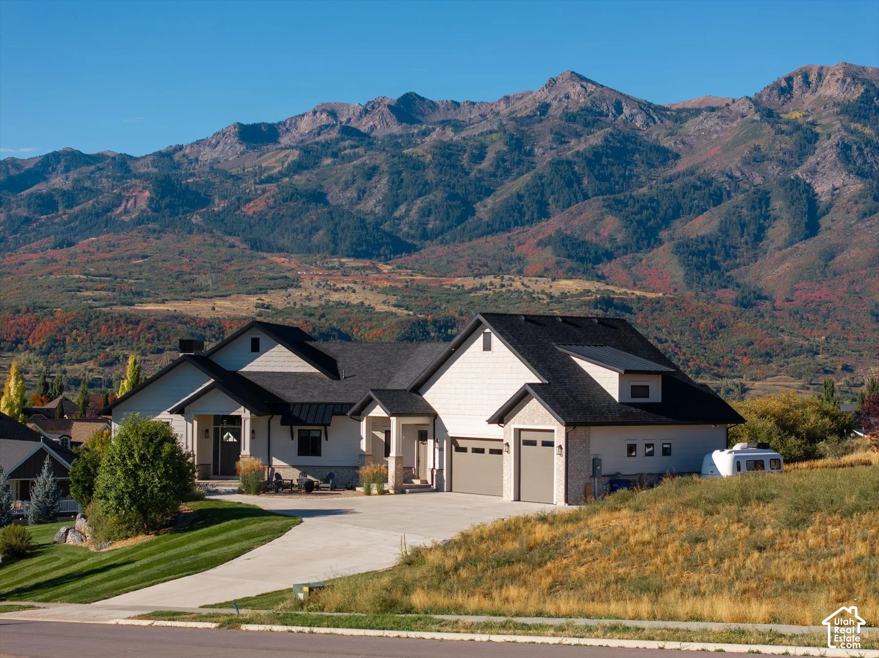 Contemporary exterior with a multi-level roofline and attached two-car garage