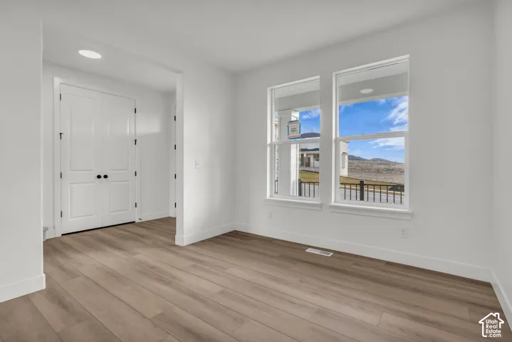 Flex/Office/Media, a spacious room off the entry with hard flooring and beautiful views to the south.