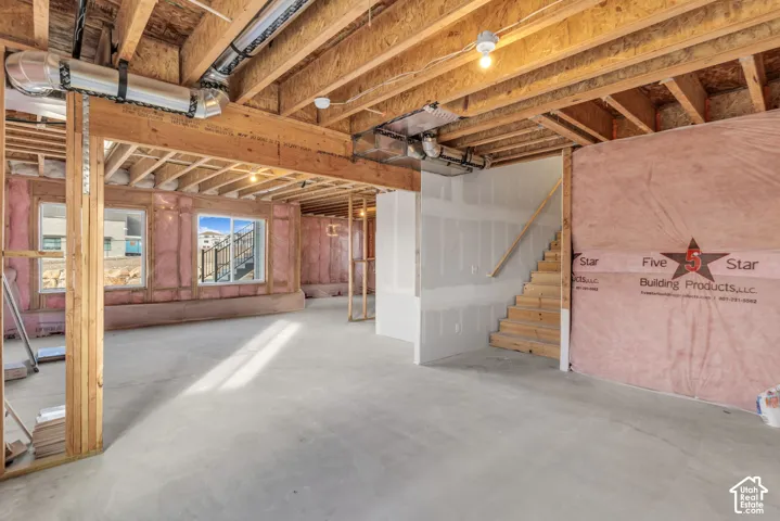 Unfinished lower level with walkout basement.  Mechanical room located in the basement with room for two or three bedrooms and large family room, plumbed for a bathroom and has a large cold storage area.  This basement has multiple windows opening to the