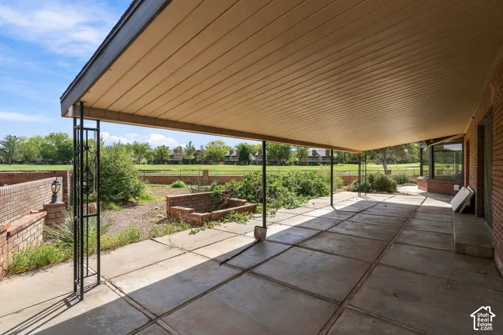 Expansive concrete patio with an extensive covered area
