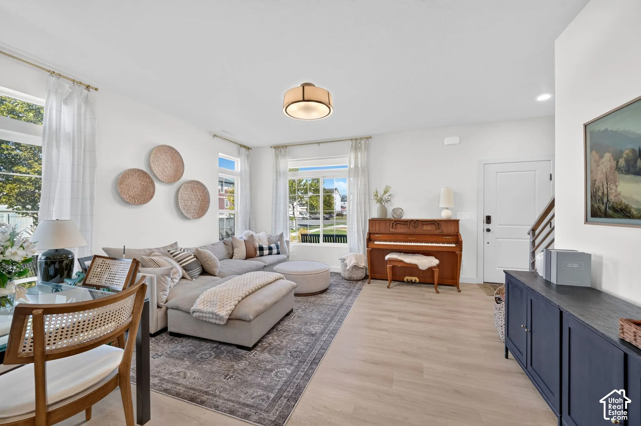 Bright interior space with light wood-finish flooring