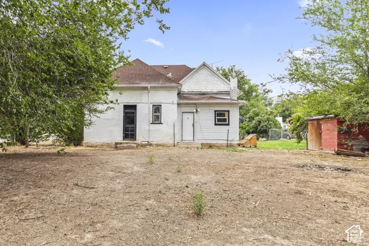 White exterior with black trim windows