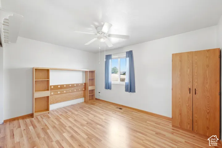 Wood-finish flooring with white walls