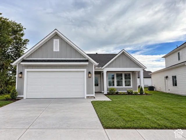 Farmhouse style exterior.*Digitally altered to show example of completed landscaping, which is included in purchase price