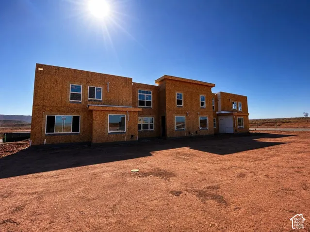 Newly constructed residence featuring multiple window installations and a multi-level design
