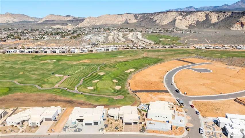 Golf course frontage with mountain backdrop