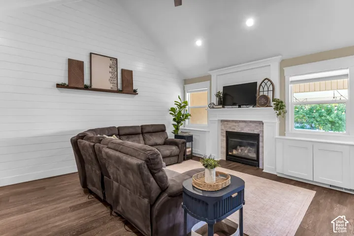 Vaulted ceiling with white shiplap accent wall