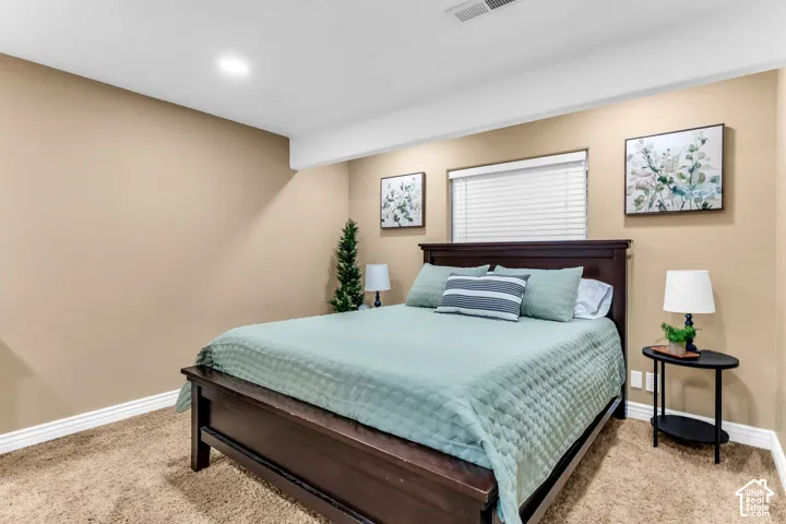 Recessed ceiling lighting illuminates the room