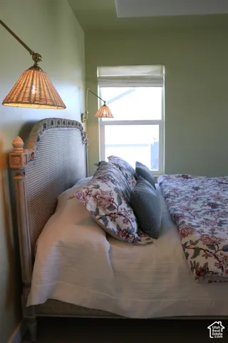Recessed ceiling element, window with shade, and wall-mounted sconces