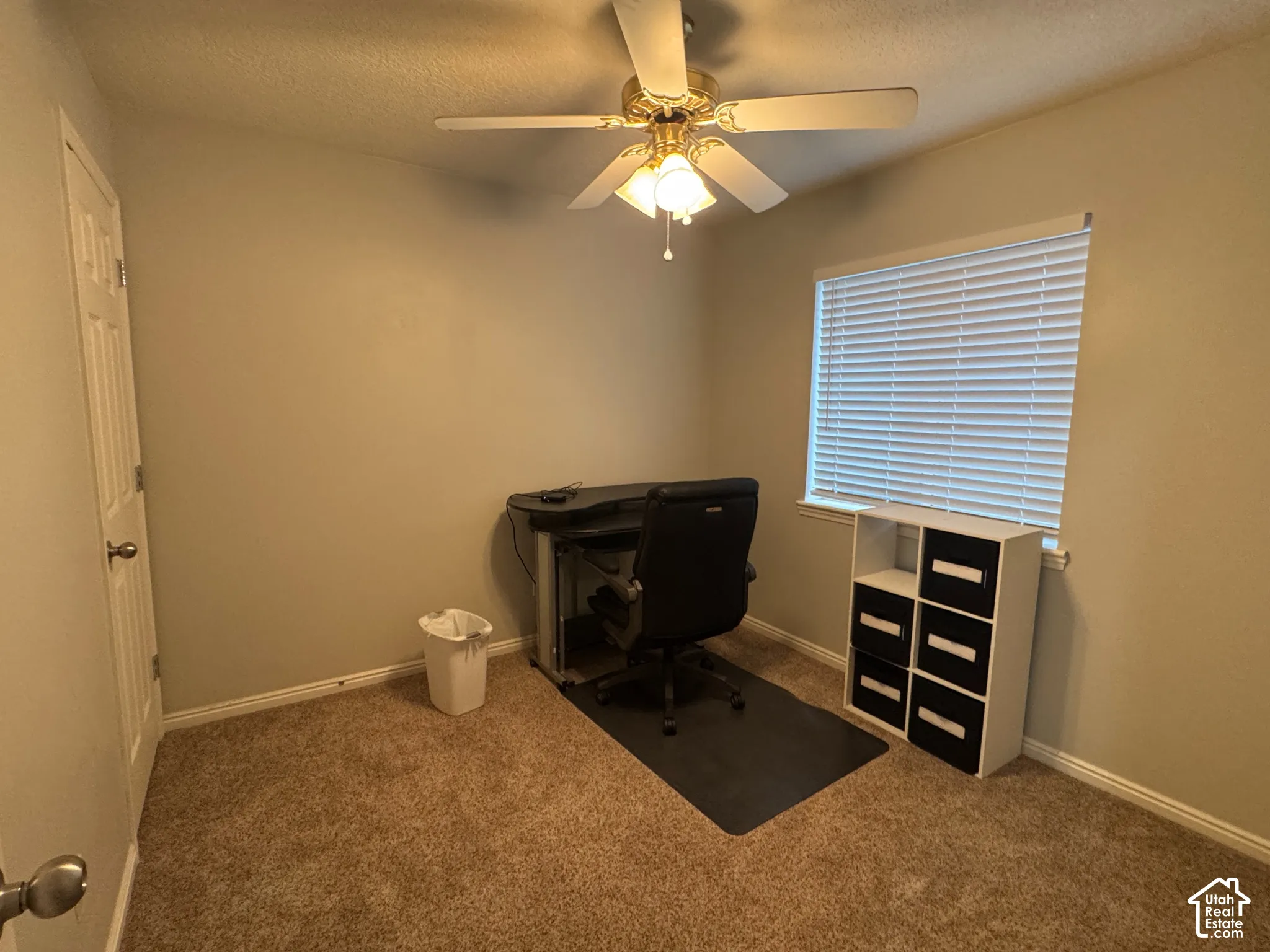 Bedroom 4 Light brown carpeted flooring with neutral wall paint and a ceiling fan with integrated lighting