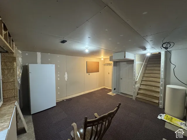 Furuter Basement Family Room Partially Finished.  Door on the left hand side is a "partially finished future bedroom."