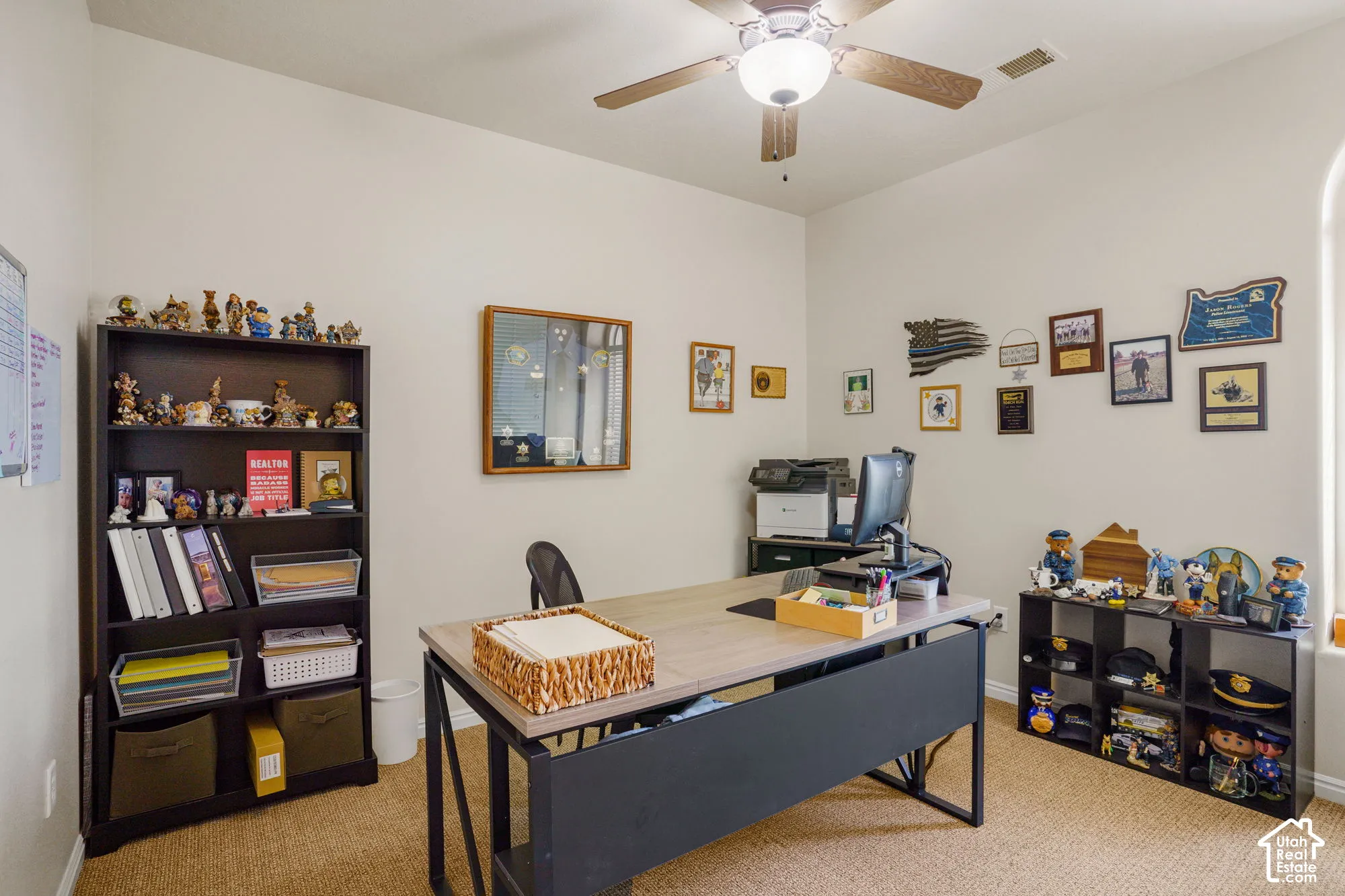Recessed lighting, ceiling fan, and light-toned walls
