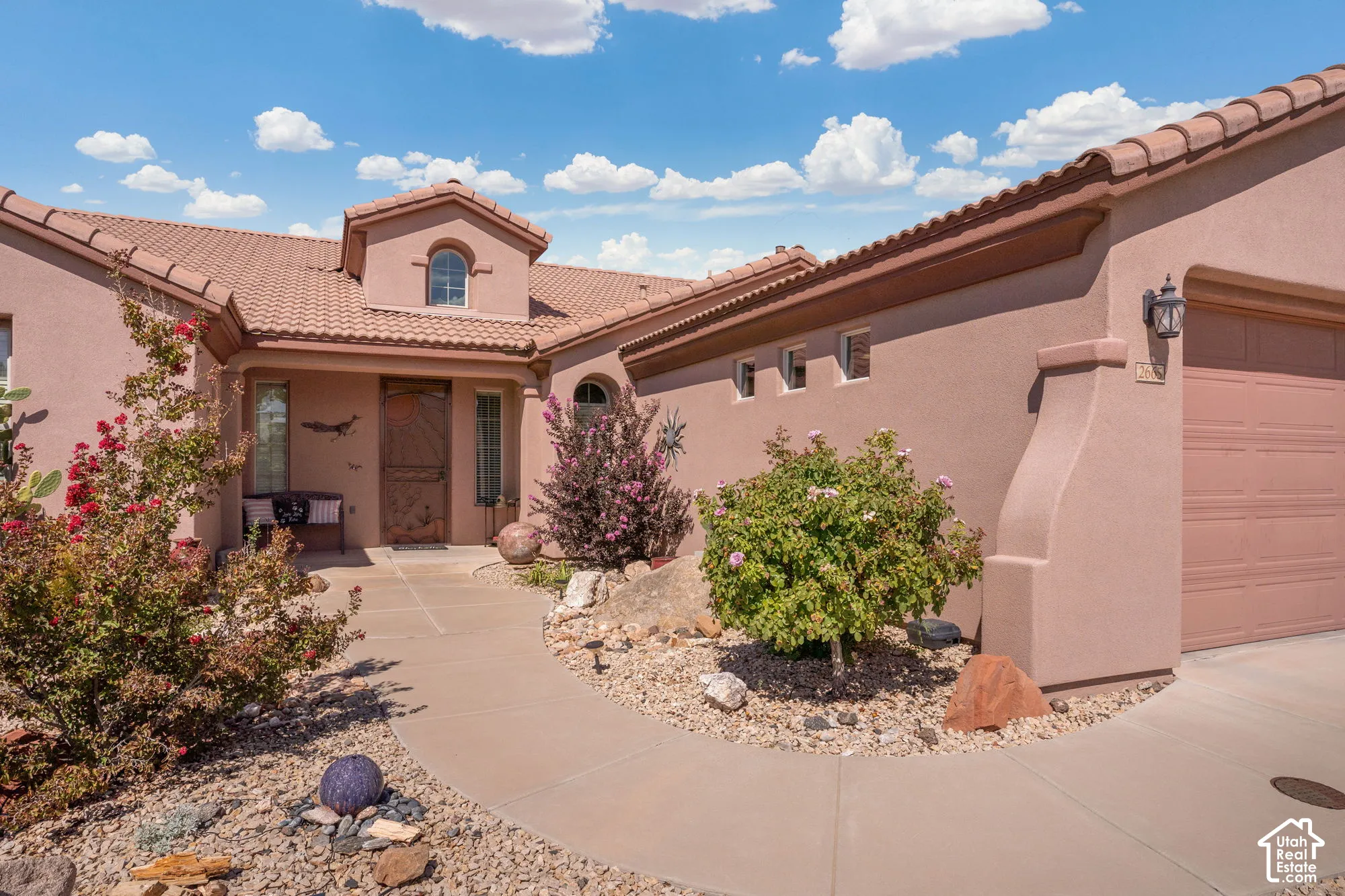 Southwestern-style stucco exterior with a tiled roof