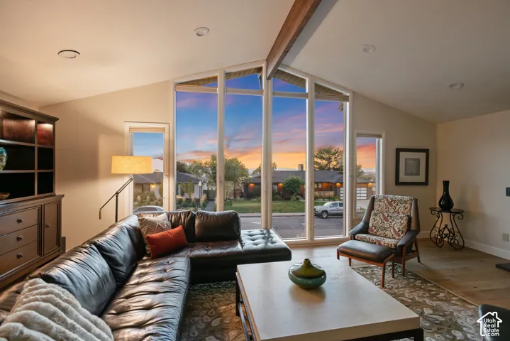 Sunset Views to look forward to! Vaulted ceiling with exposed wood beam