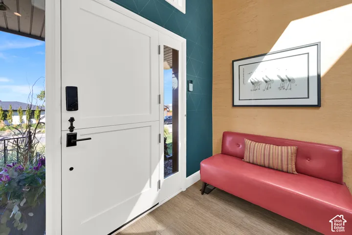 Bright entry with Dutch door, Skylights, seating area and large closet