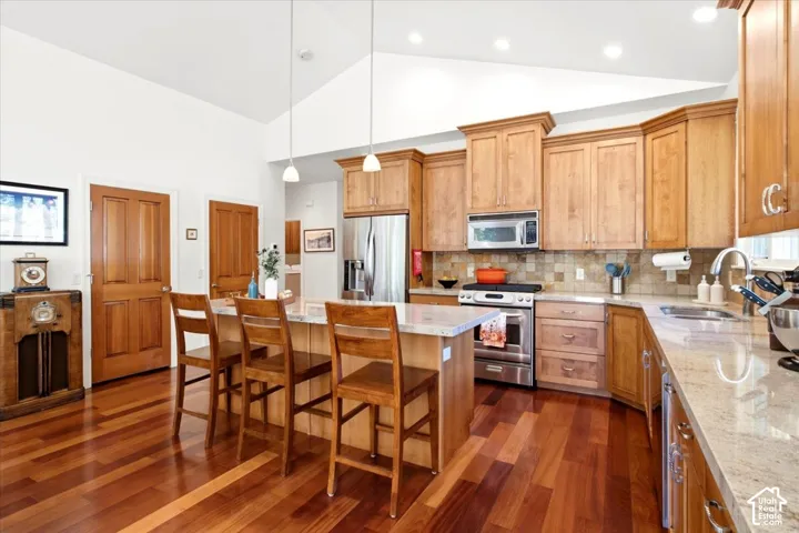 Kitchen featuring stainless steel appliances, and a center island