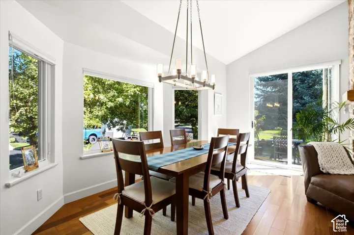 Dining area featuring multiple large windows, and a sliding glass door
