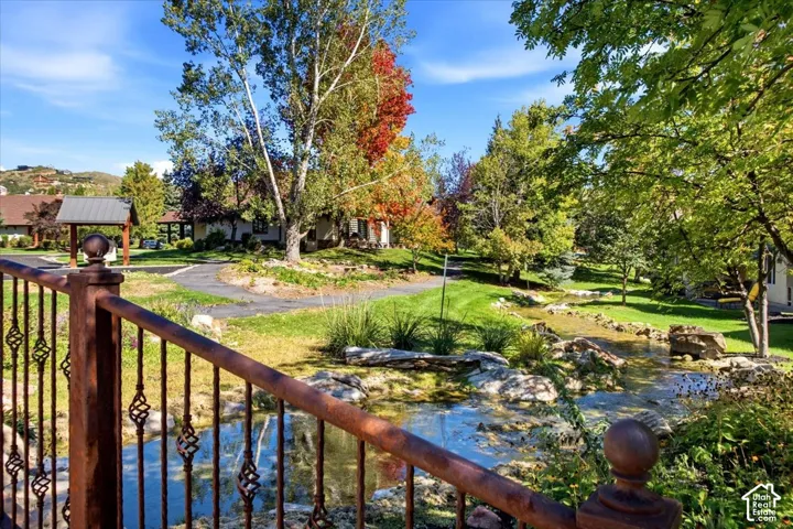 walking path bridge overlooking a creek