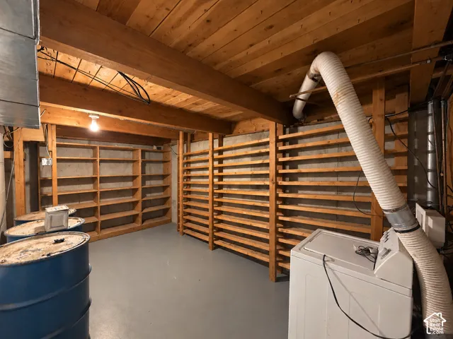Exposed wood beam ceiling with recessed lighting