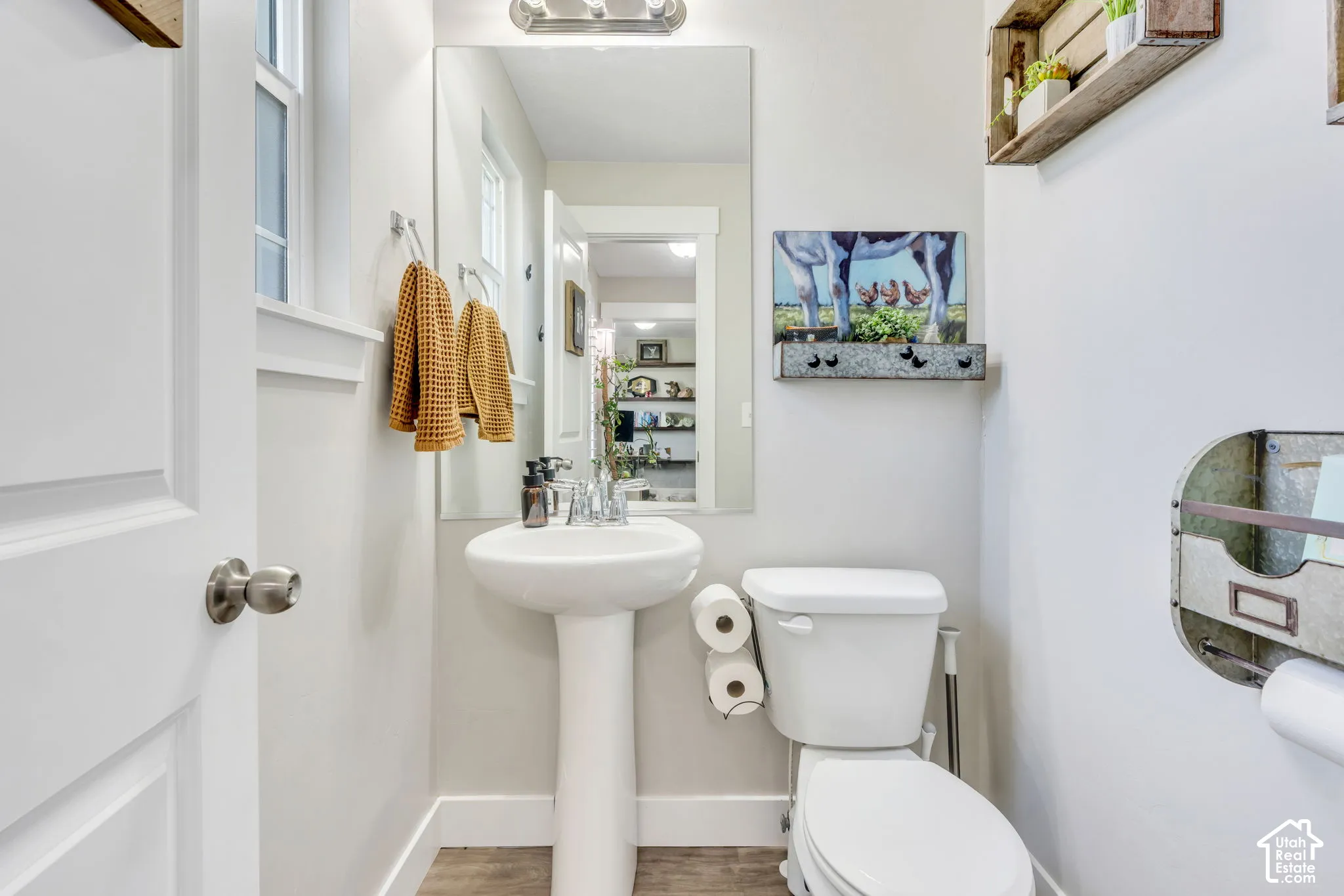 Pedestal sink with chrome-finish faucet