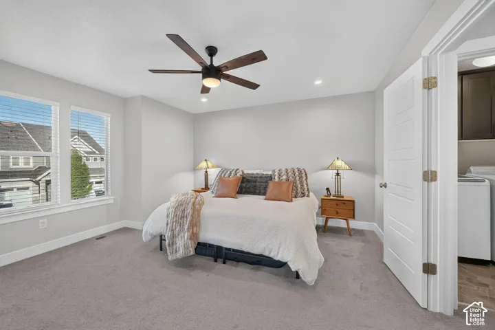 Recessed lighting, ceiling fan, and carpeted flooring