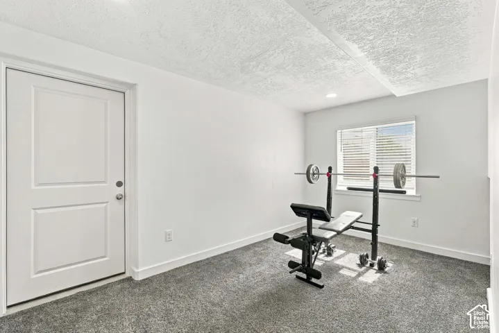 basement recreation room with cold storage access