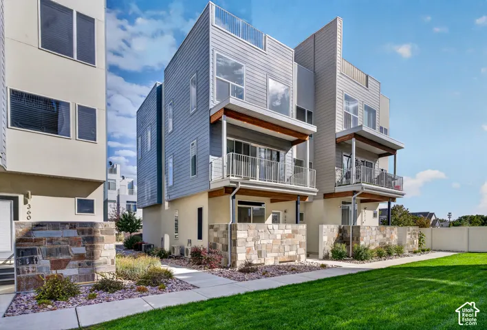 Contemporary multi-story architecture with horizontal siding