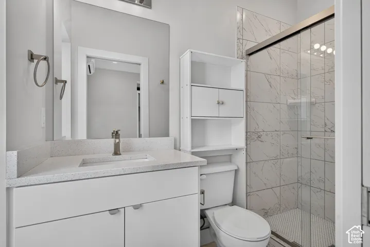 Modern vanity with an integrated sink and light-toned countertop