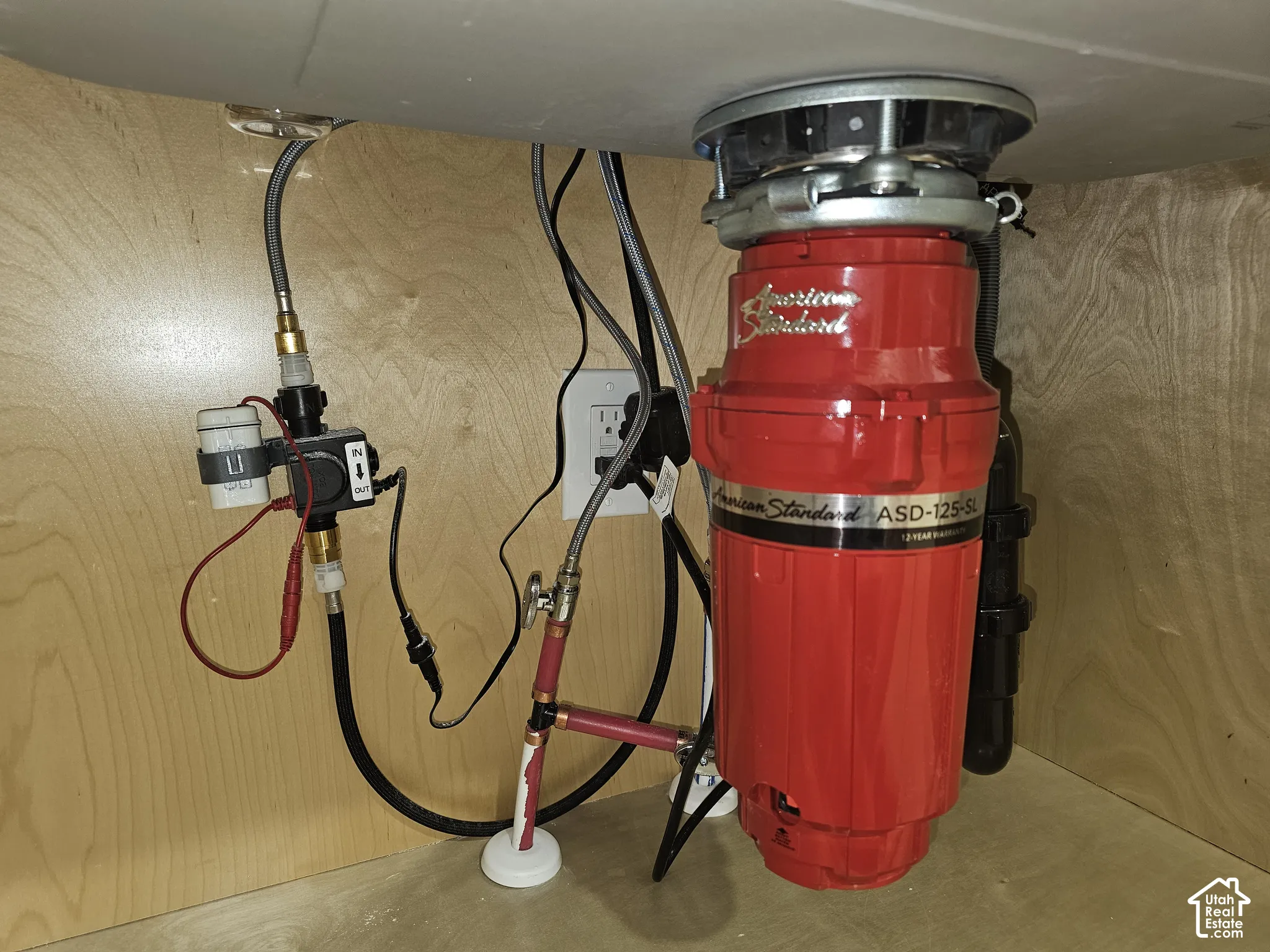 American Standard 1 1/4 HP garbage disposal with a 12 year warranty