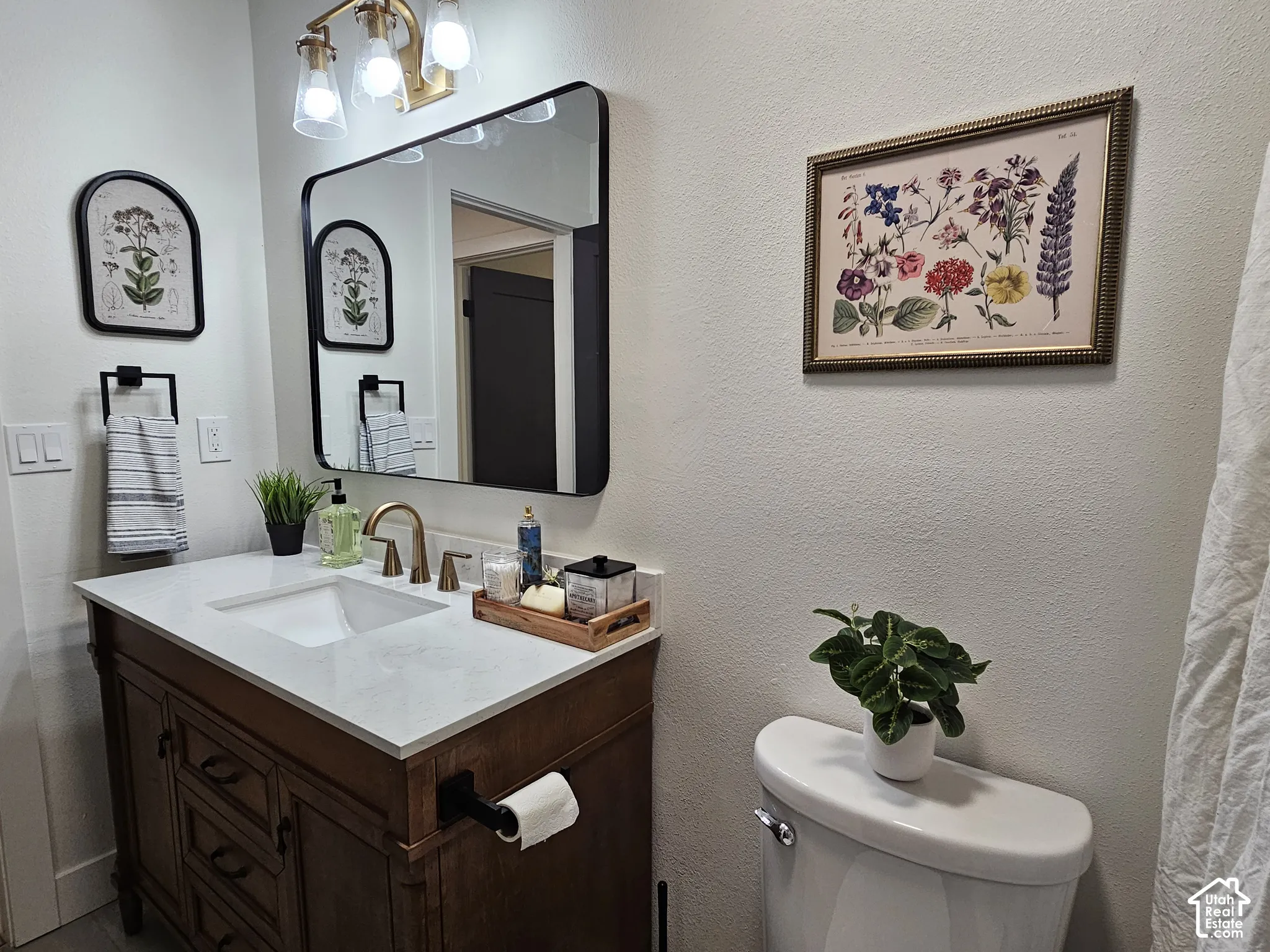 Main bathroom with custom vanity and large mirror