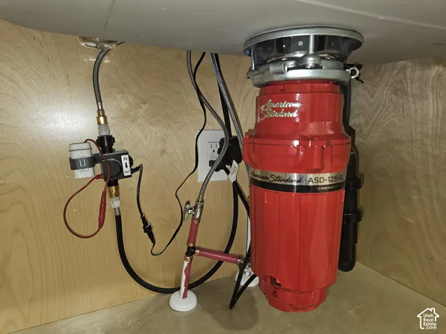 American Standard 1 1/4 HP garbage disposal with a 12 year warranty