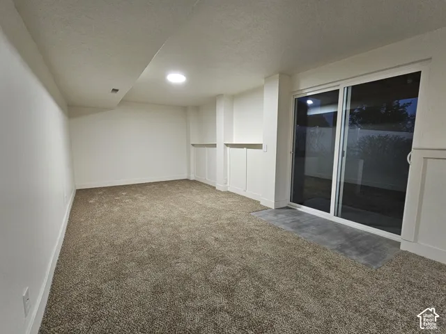 Sliding glass door leads to covered patio