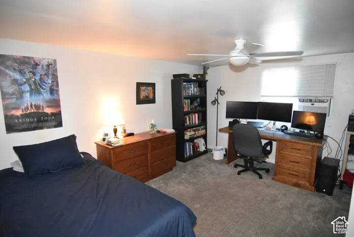 Large bedroom in the ADU. Recessed lighting, ceiling fan, and carpeted flooring