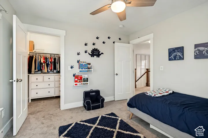 Recessed lighting, ceiling fan with integrated light, built-in closet storage, paneled interior doors, and carpeted flooring