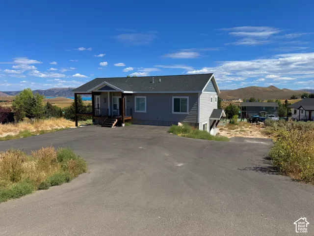 Gray siding exterior with dark gray roof