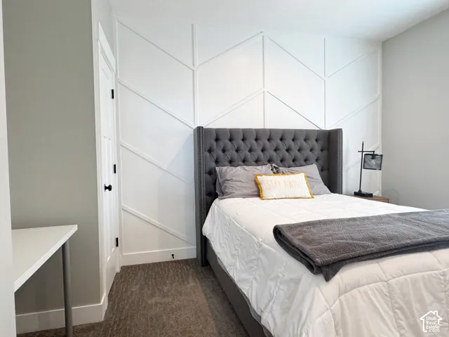 White accent wall with geometric paneling