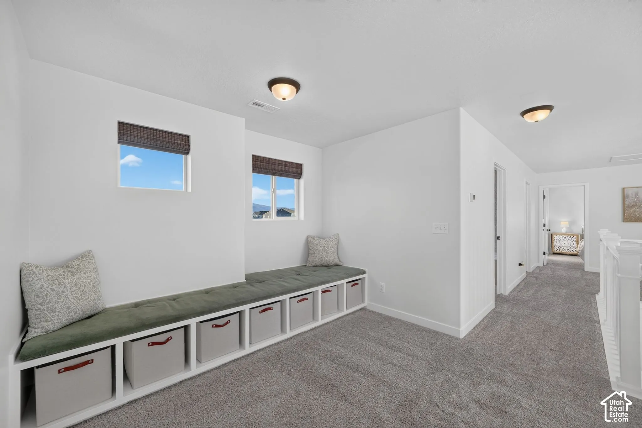 Built-in window bench with integrated storage cubbies