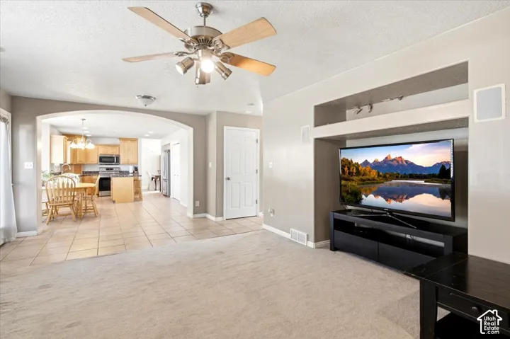 Living area with carpeted flooring