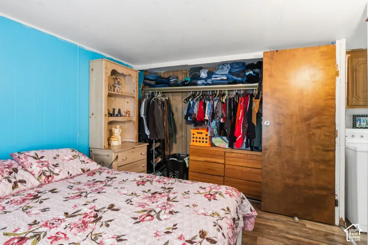 Built-in closet system with shelving and clothing rods
