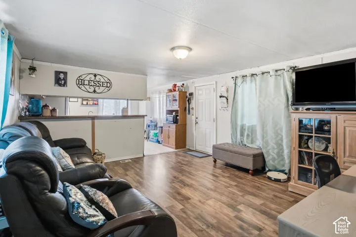 Wood-finish flooring throughout the living area