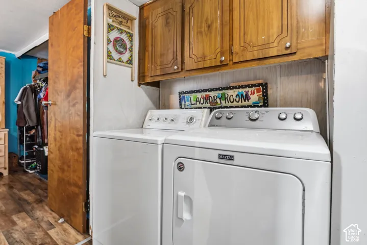 Dedicated laundry area featuring a washer and dryer